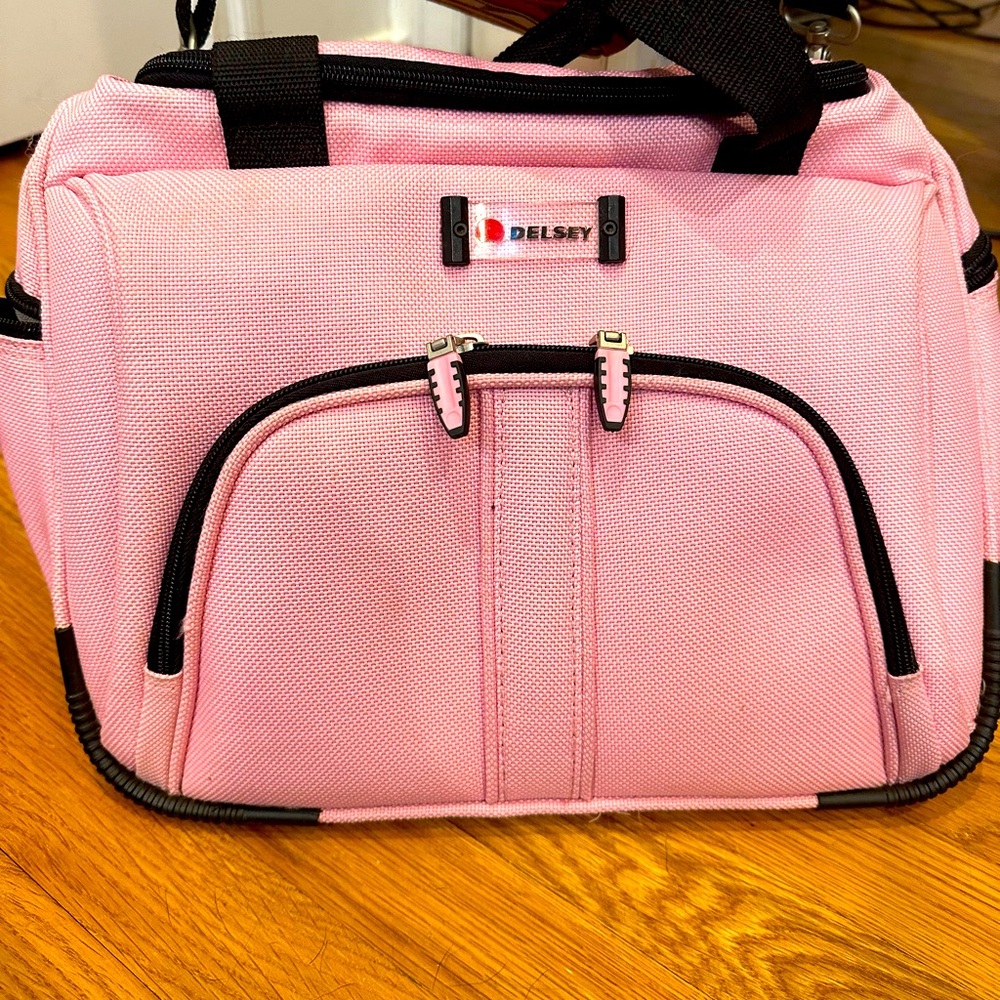 Delsey pink carry on bag luggage